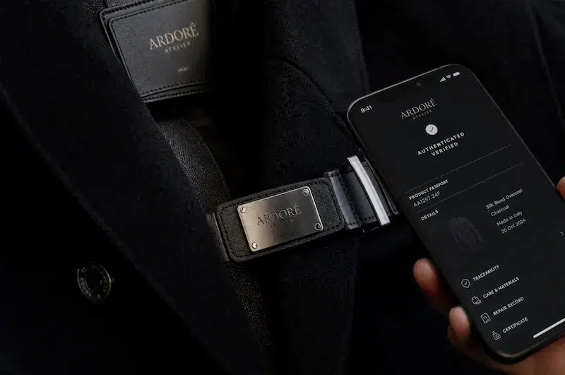 NFC-enabled metal label showing digital product authentication on smartphone